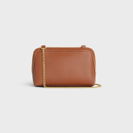 CLUTCH ON CHAIN CUIR TRIOMPHE IN SMOOTH CALFSKIN TAN